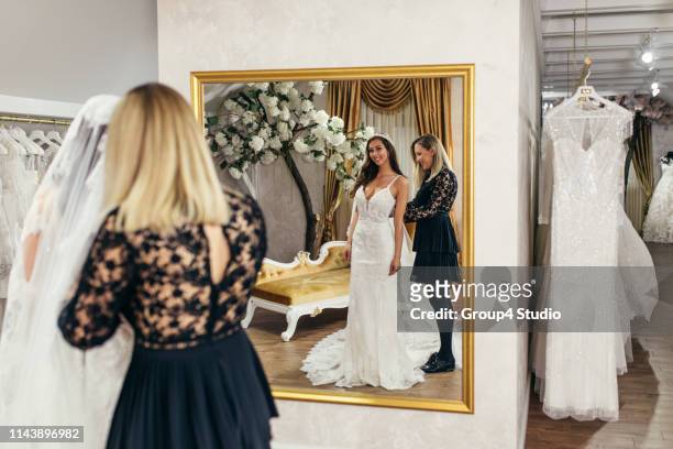beautiful bride in wedding salon - wedding vendor stock pictures, royalty-free photos & images