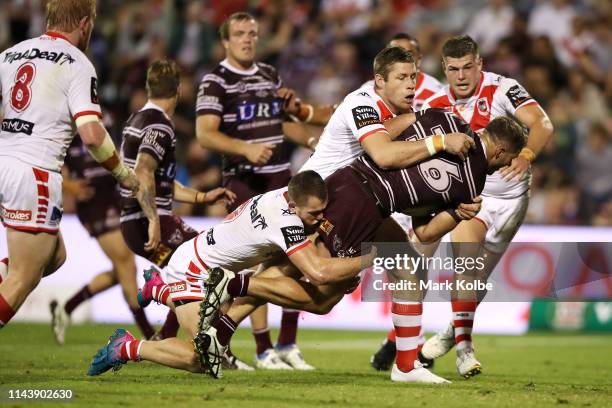 Corey Waddell of the Sea Eagles is tackled during the round 6 NRL match between the Dragons and the Sea Eagles at WIN Stadium on April 20, 2019 in...