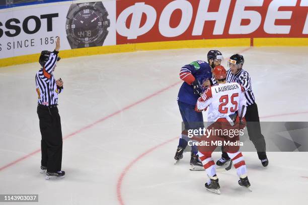 S Robert Farmer and Denmark's Oliver Lauridsen clash during the 2019 IIHF Ice Hockey World Championship Slovakia group A game between Great Britain...