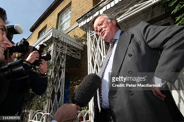 Justice Secretary Kenneth Clarke talks to reporters as he leaves home on May 19, 2011 in London, England. Mr Clarke is facing criticism over his...
