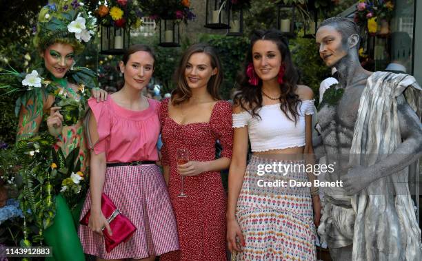 Alexandra Carello, Niomi Smart and Rosanna Falconer attend The Ivy Chelsea Garden's Summer Garden Party on May 14, 2019 in London, England.