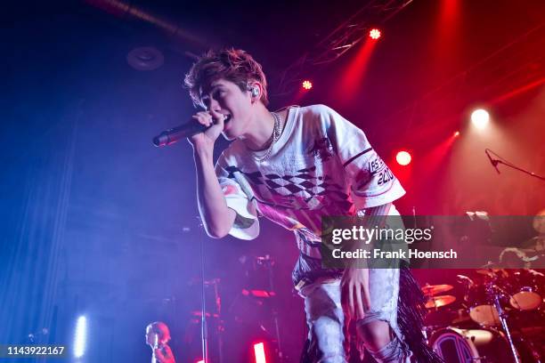 Singer Taka of the Japanese band One Ok Rock performs live on stage during a concert at the Huxleys on May 14, 2019 in Berlin, Germany.