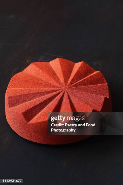 contemporary chocolate mousse cake made in geometric silicone mold - jello mold stock-fotos und bilder