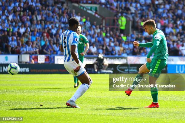 Gerard Deulofeu of Watford FC scores the opening goal during the Premier League match between Huddersfield Town and Watford FC at John Smith's...