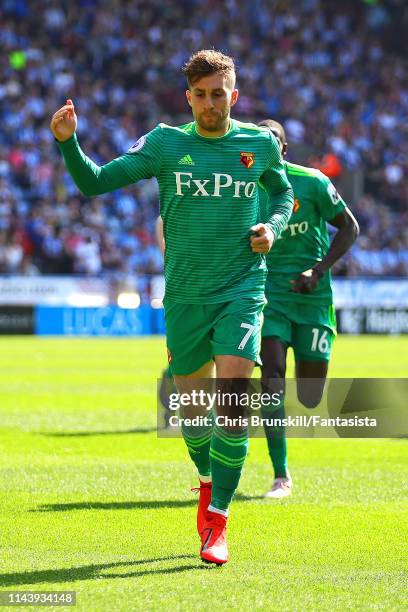 Gerard Deulofeu of Watford FC celebrates scoring the opening goal during the Premier League match between Huddersfield Town and Watford FC at John...