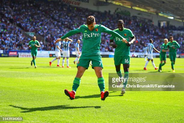 Gerard Deulofeu of Watford FC celebrates scoring the opening goal during the Premier League match between Huddersfield Town and Watford FC at John...