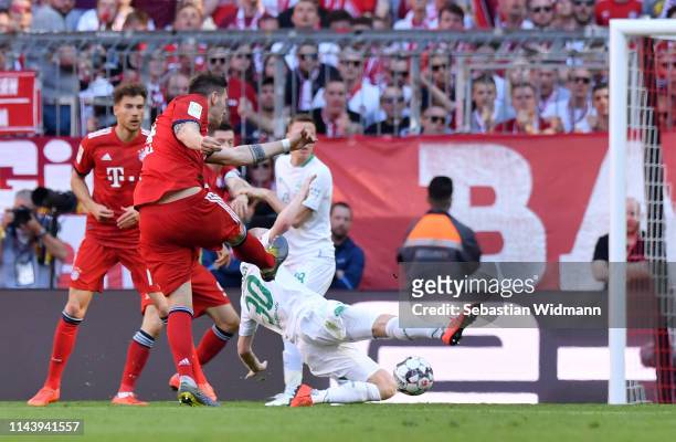 Niklas Suele of Bayern Munich scores his team's first goal during the Bundesliga match between FC Bayern Muenchen and SV Werder Bremen at Allianz...