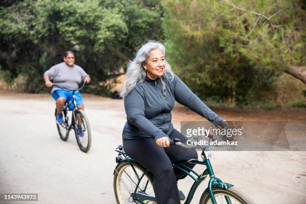 Senior Mexican Couple Riding Bikes