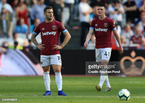 Jack Wilshere and Declan Rice of West Ham United look on during the Premier League match between West Ham United and Leicester City at London Stadium...