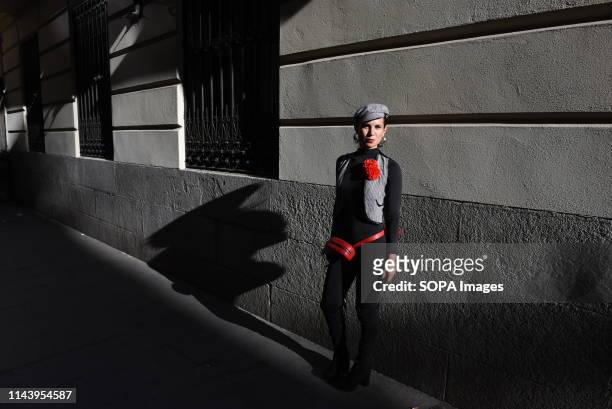 Woman dressed in Chulapa is seen posing for a picture during the Re-inventando Chulap's fashion contest in Madrid. Re-inventando Chulap, is...