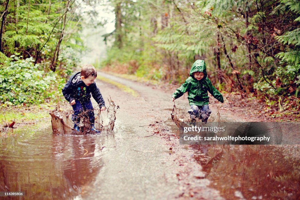 Children in mud puddles