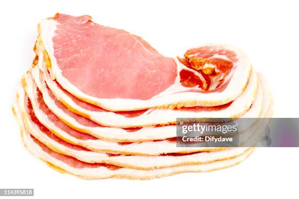 six slices of vertically stacked bacon on white background - bacon stock pictures, royalty-free photos & images