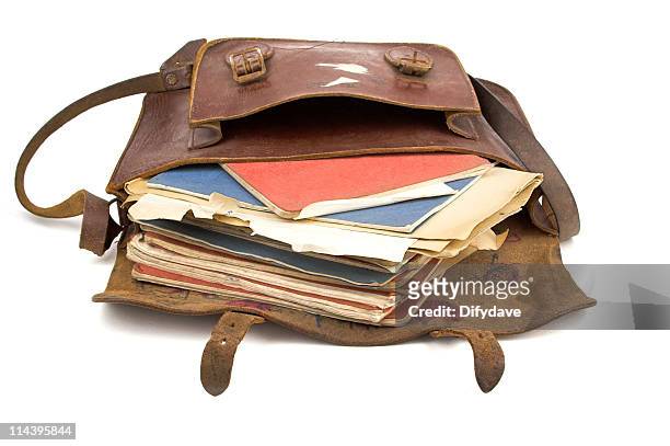 school satchel open with books - leather bag stock pictures, royalty-free photos & images