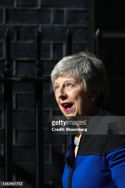 Theresa May, U.K. Prime minister, reacts as she greets Jens Stoltenberg, secretary general of the North Atlantic Treaty Organization , ahead of their...