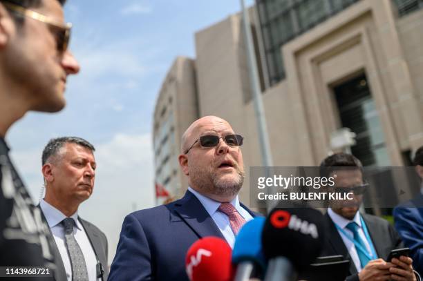 Embassy charge d'affaires Jeffrey Hovenier speaks to media in front of the Caglayan courthouse on May 15 in Istanbul, after US consular staffer Metin...