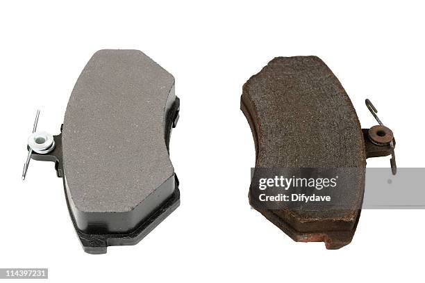 disc brake pads old and new - brake pad stock pictures, royalty-free photos & images