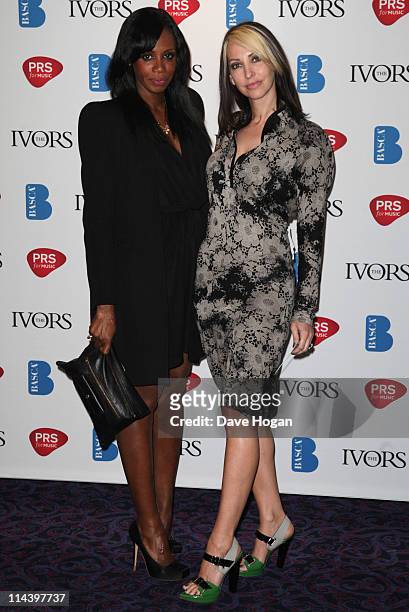 Shaznay Lewis and Natalie Appleton attend The Ivor Novello Awards 2011 at The Grosvenor House Hotel on May 19, 2011 in London, England.