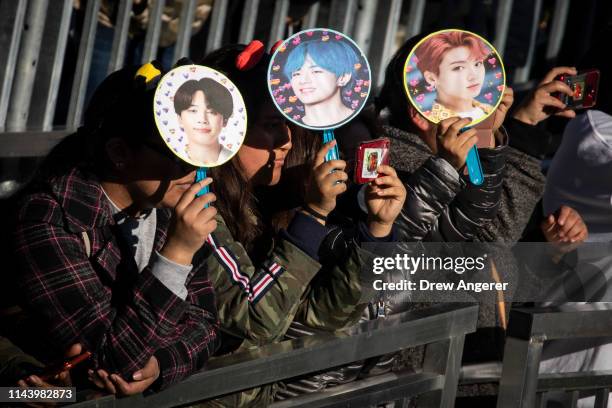 Fans wait for K-Pop group BTS to take the stage in Central Park, May 15, 2019 in New York City. Fans waited in line for days to see the group perform...