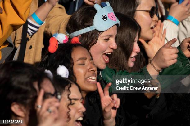 Fans cheer as K-Pop group BTS performs in Central Park, May 15, 2019 in New York City. Fans waited in line for days to see the group perform as part...