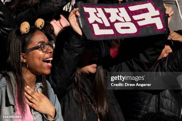 Fans cheer as K-Pop group BTS performs in Central Park, May 15, 2019 in New York City. Fans waited in line for days to see the group perform as part...