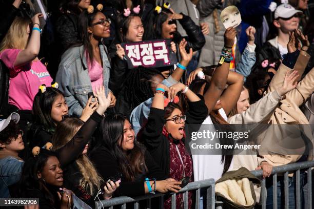 Fans cheer as K-Pop group BTS performs in Central Park, May 15, 2019 in New York City. Fans waited in line for days to see the group perform as part...