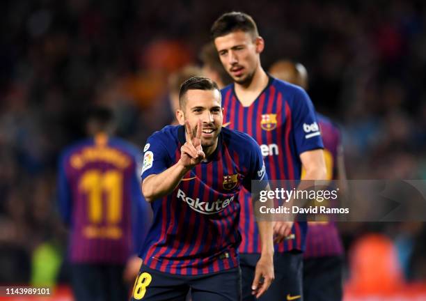 Jordi Alba of Barcelona celebrates after scoring his sides second goal during the La Liga match between FC Barcelona and Real Sociedad at Camp Nou on...