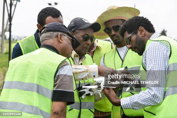 Participants take part in the first drone flight training by the World Food Programme for humanitarian and development work in Ethiopia on May 15 in...