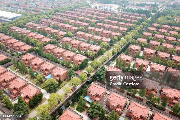 Huaxi village, known as the no.1 village in the world, is seen in an aerial photo taken on May 12, 2019 in wuxi, east China's jiangsu province....