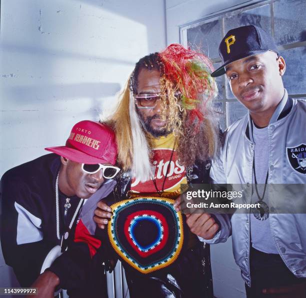 Public Enemy members Chuck D, Flavor Flav, and the one and only George Clinton pose for a portrait in October 1989 in Los Angeles, California.