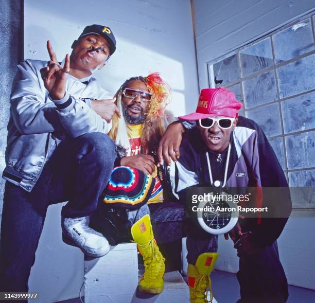 Public Enemy members Chuck D, Flavor Flav, and the one and only George Clinton pose for a portrait in October 1989 in Los Angeles, California.