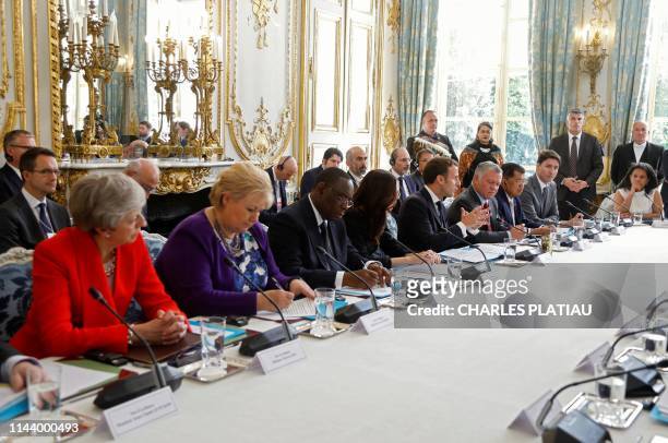 Britain's Prime Minister Theresa May, Norway's Prime Minister Erna Solberg, Senegal's President Macky Sall, New Zealand's Prime Minister Jacinda...