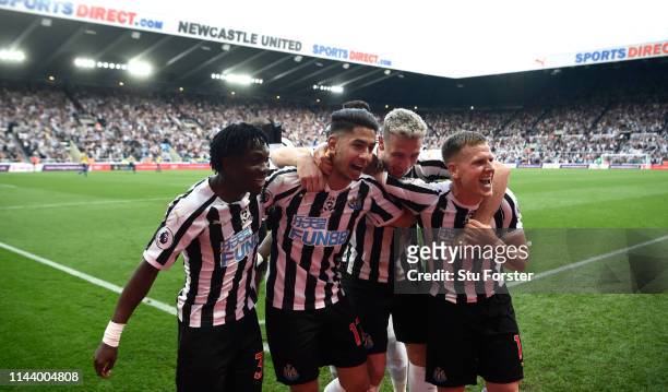 Newcastle striker Ayoze Perez celebrates his hat trick goal with team mates during the Premier League match between Newcastle United and Southampton...