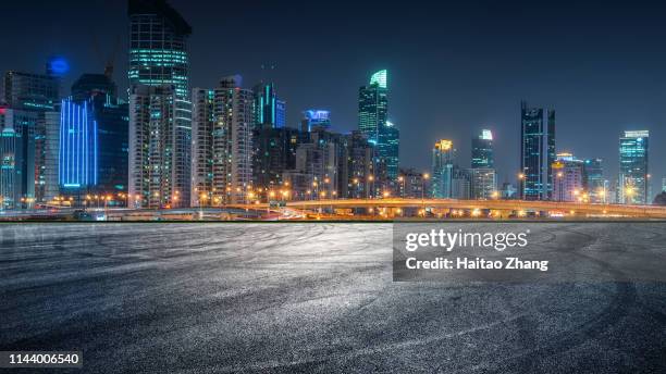 nightscape of shanghai city scenic road - city lights reflected on buildings speed stock pictures, royalty-free photos & images