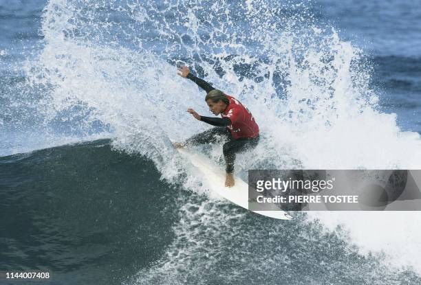 Australian Dean Morrison rides a wave to score a convincing victory over compatriot Chris Davidson in round two of the Rip Curl Pro at Bells Beach,...