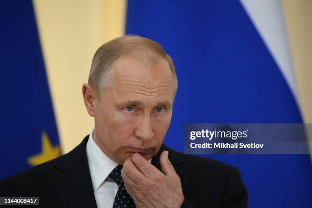 Russian President Vladimir Putin speaks during a joint press conference with Austrian President Alexander Van der Bellen during a meeting on May 15,...