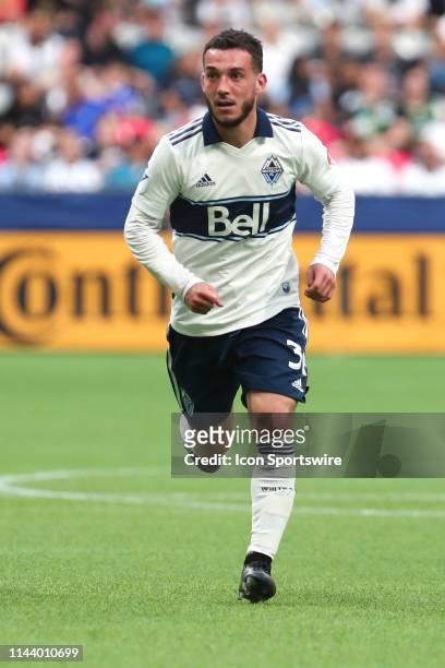 Vancouver Whitecaps defender Russell Teibert runs down the field during their match against the Portland Timbers at BC Place on May 10, 2019 in...