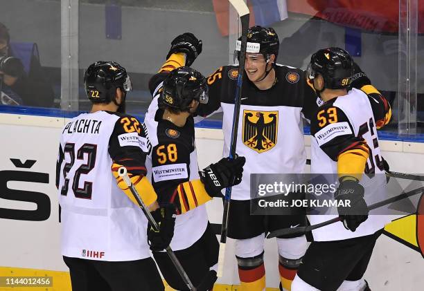 Players of Germany celebrates after scoring during the group A stage match Germany vs Slovakia of the 2019 IIHF Ice Hockey World Championship at...