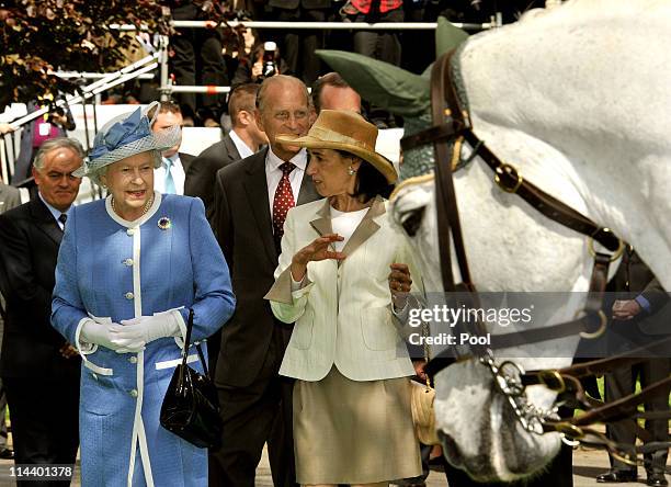 Queen Elizabeth II and Chryss O'Reilly, Chair of the Board of The Irish National Stud, tour the Irish National Stud, during the third day of the...