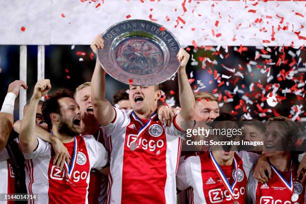 Daley Blind of Ajax, Matthijs de Ligt of Ajax, Dusan Tadic of Ajax, Frenkie de Jong of Ajax celebrates the championship with the Eredivisie Trophy...