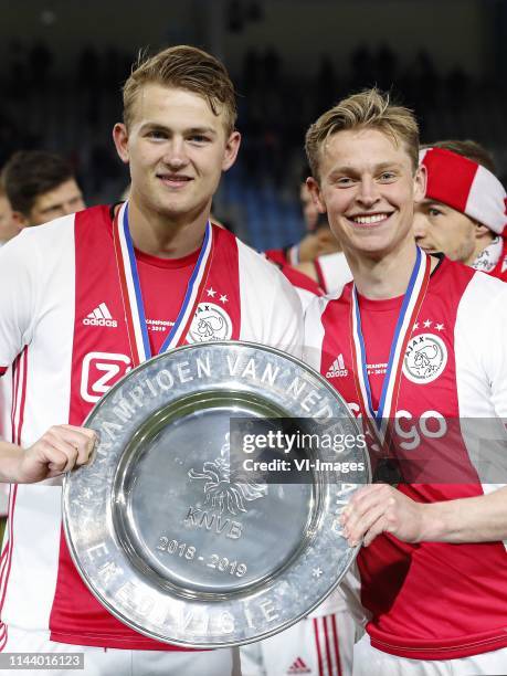 Matthijs de Ligt of Ajax, Frenkie de Jong of Ajax with the trophy, dish during the Dutch Eredivisie match between De Graafschap Doetinchem and Ajax...