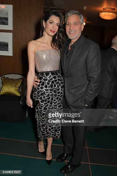 Amal Clooney and George Clooney attend the London Premiere after party for new Channel 4 show "Catch-22", based on Joseph Heller's novel of the same...