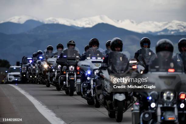 Police officers arrive at the celebration of life ceremony for Kendrick Castillo at Cherry Hills Community Church on May 15, 2019 in Highlands Ranch,...