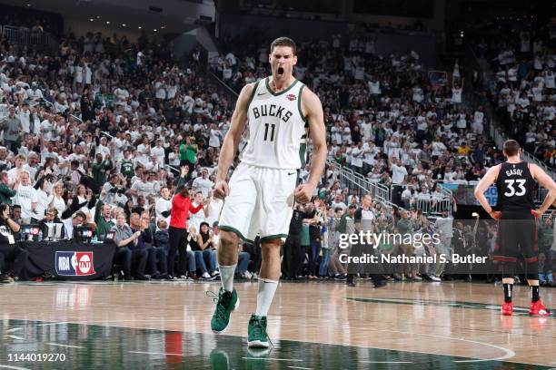 Brook Lopez of the Milwaukee Bucks handles the ball against the Toronto Raptors during Game One of the Eastern Conference Finals of the 2019 NBA...