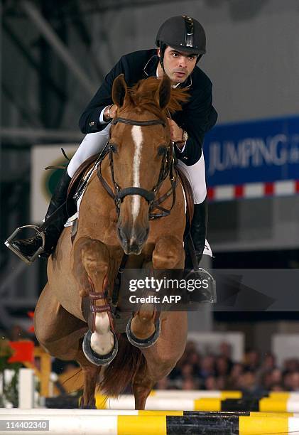 Brazilian Rodrigo Pessoa wins on Baloubet du Rouet the 10th event of the jumping world Cup, 07 February 2004 in Bordeaux. AFP PHOTO PIERRE COSTABADIE