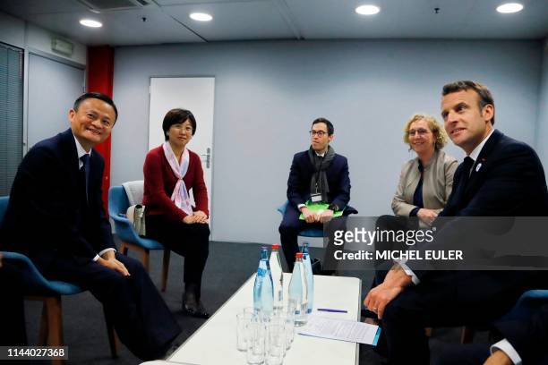 French President Emmanuel Macron and founder of Alibaba group Jack Ma pose prior to a meeting at the Vivatech startups and innovation fair, on May...