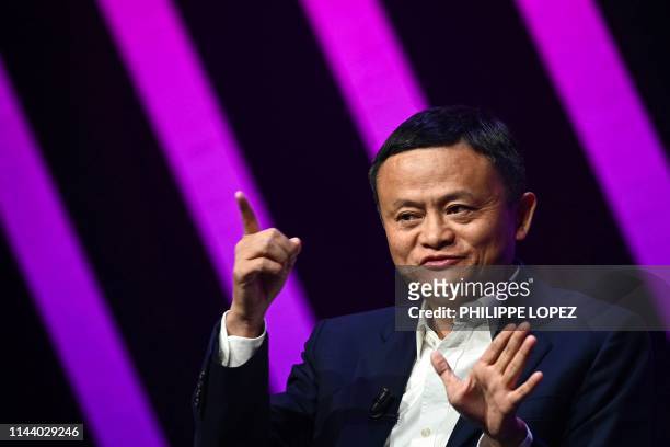 Jack Ma, CEO of Chinese e-commerce giant Alibaba, gestures as he speaks during his visit at the Vivatech startups and innovation fair, in Paris on...