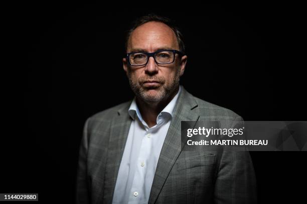 Co-founder of the online non-profit encyclopedia Wikipedia Jimmy Wales poses during a photo session at the Vivatech fair in Paris, on May 16, 2019.