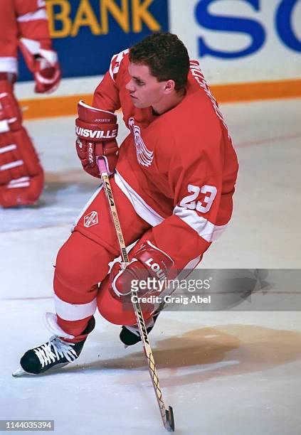 Greg Johnson of the Detroit Red Wings skates against the Toronto Maple Leafs during NHL game action on February 20, 1995 at Maple Leaf Gardens in...