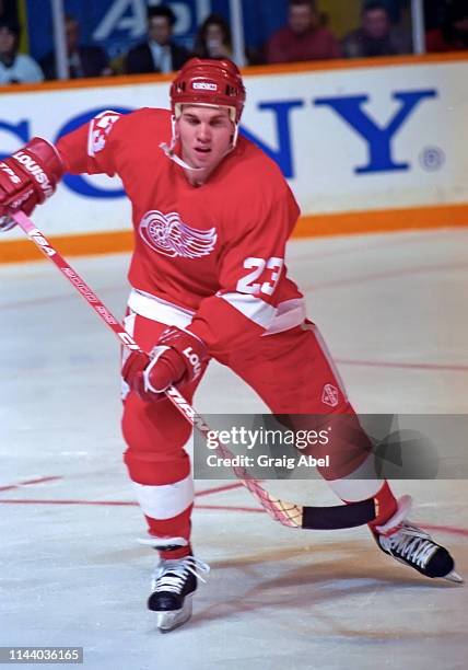 Greg Johnson of the Detroit Red Wings skates against the Toronto Maple Leafs during NHL game action on February 20, 1995 at Maple Leaf Gardens in...