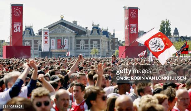 Ajax Amsterdam's supporters gather on the Museumplein in Amsterdam to celebrate their club's new title in the Dutch Eredivisie football league on May...